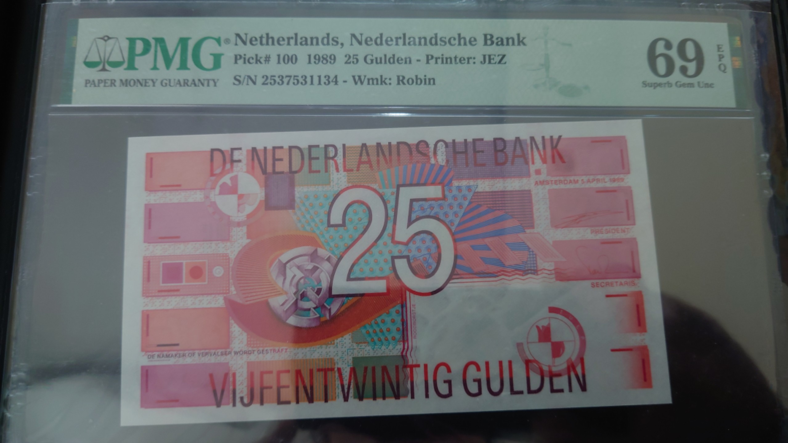 【世界钱币收藏】精品微拍第53期暨2022年第十期 众多裸钞评级币超低价起拍 年末让利 出价极有大可能中标 1989年荷兰25盾 齿轮 PMG69E亚军分少见 尾4