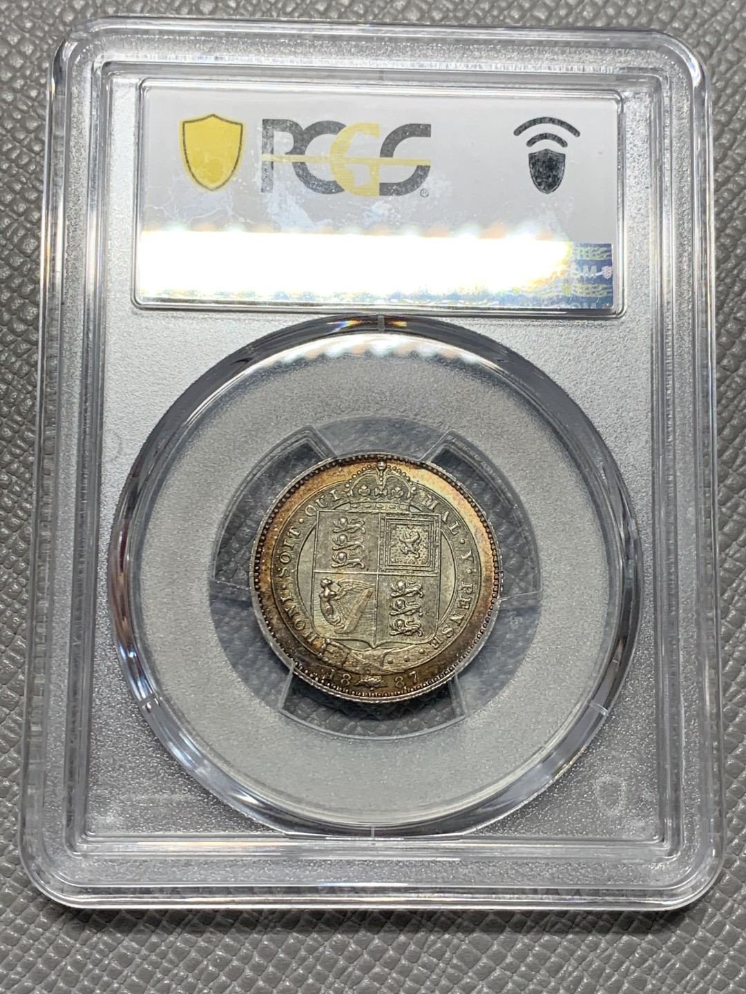 《竞宝斋》第128场-周日，周一 ，2场连拍（全场包邮） PCGS MS64 英国 1887年一先令银币，五彩包浆，收藏级别，非常精致