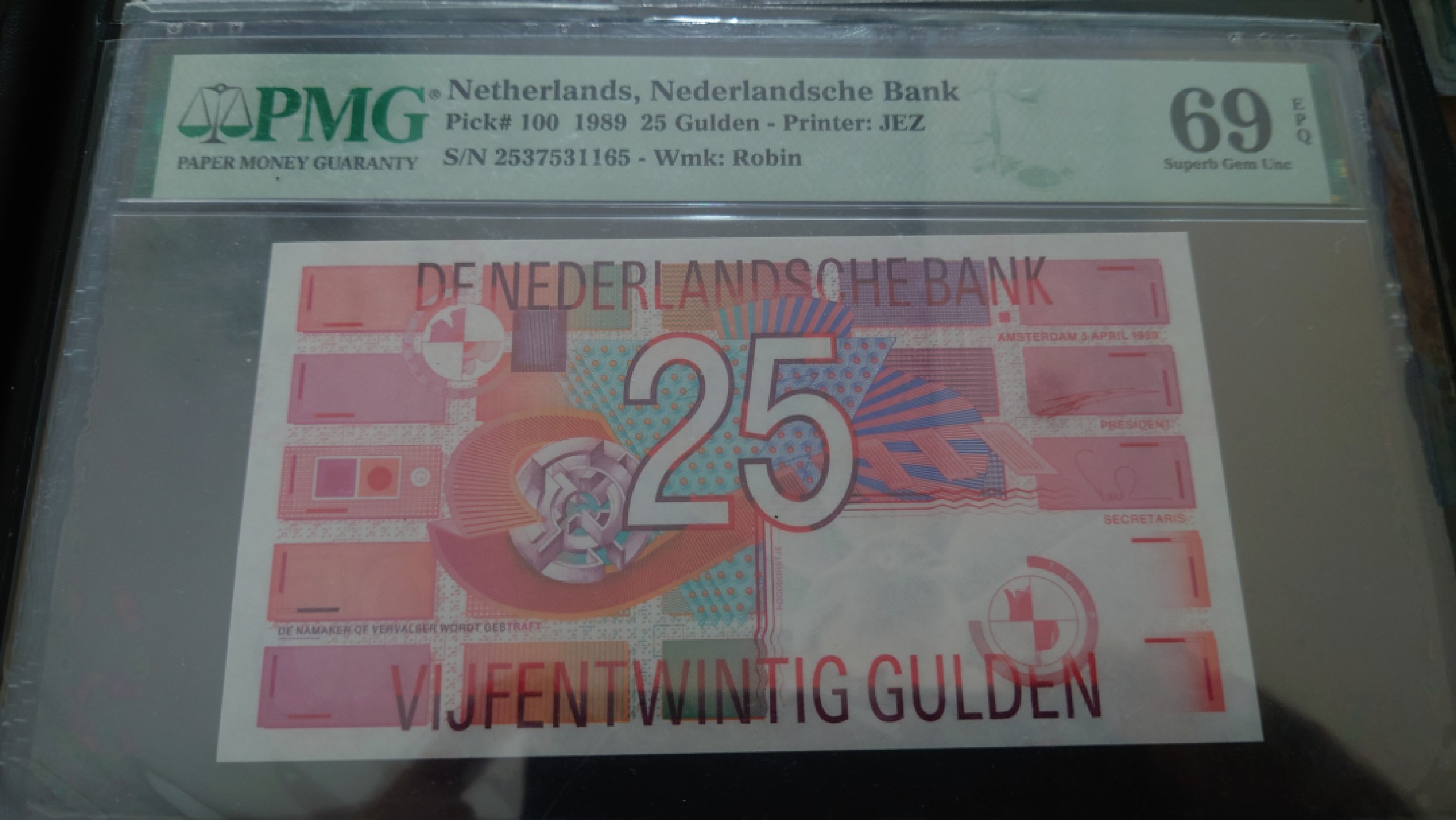 【世界钱币收藏】精品微拍第53期暨2022年第十期 众多裸钞评级币超低价起拍 年末让利 出价极有大可能中标 1989年荷兰25盾 齿轮 PMG69E亚军分少见 全程无4