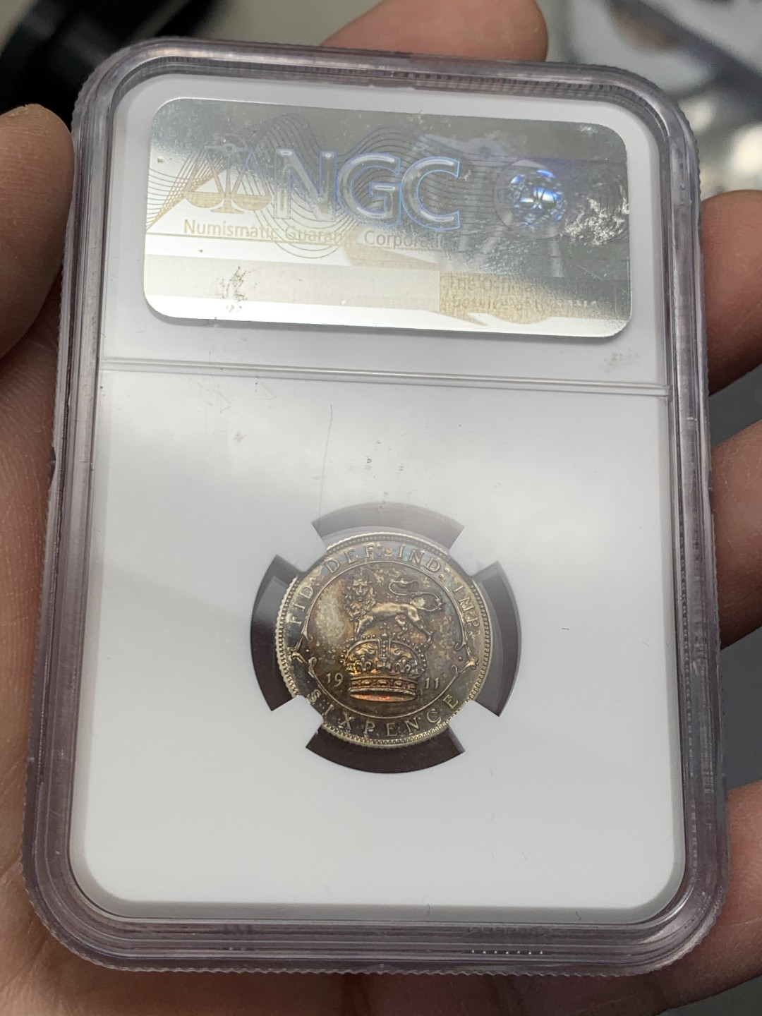 《竞宝斋》第128场-周日，周一 ，2场连拍（全场包邮） NGC PF65 英国1911年乔五精制6便士银币五彩高分