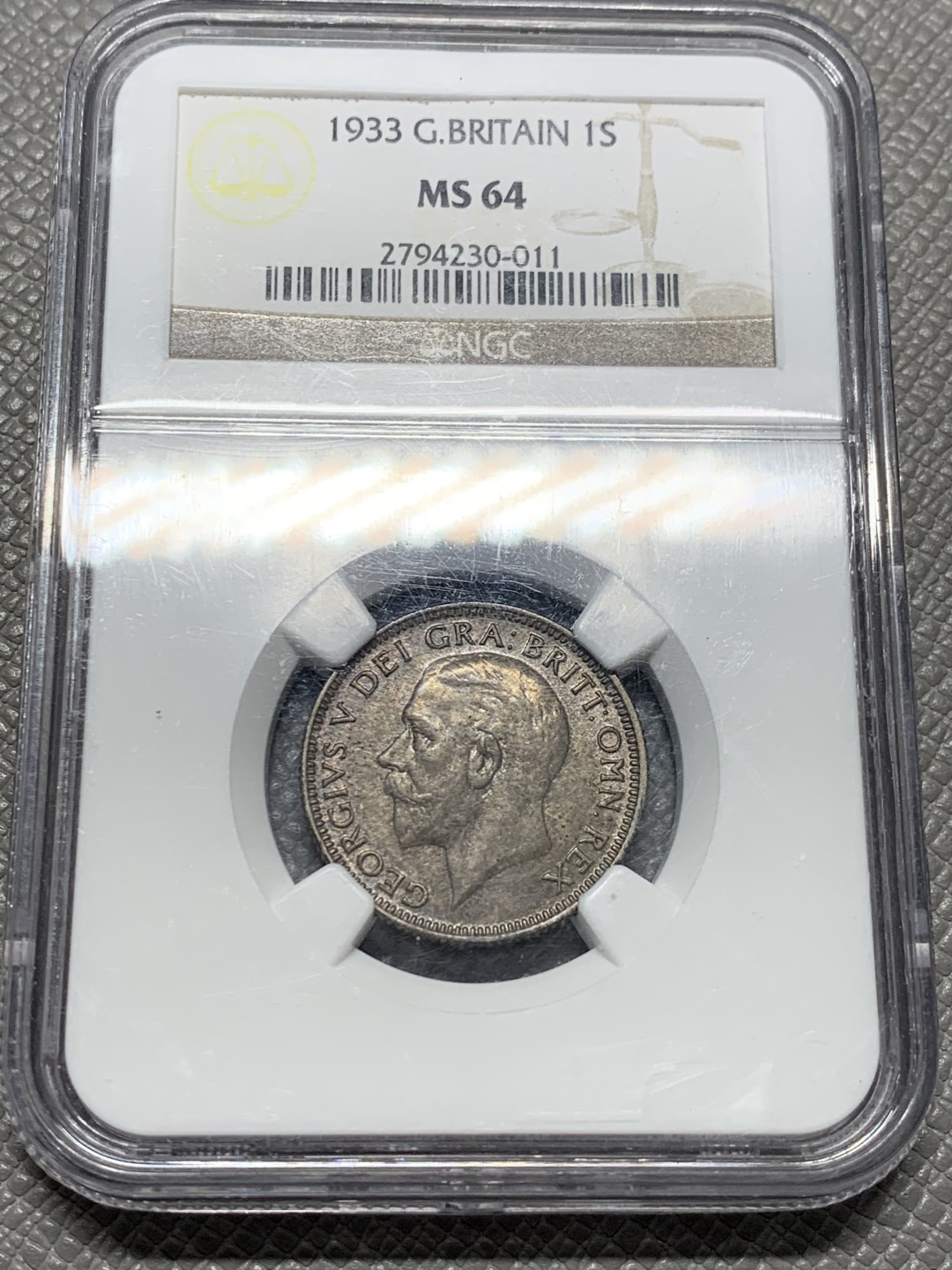 《竞宝斋》第128场-周日，周一 ，2场连拍（全场包邮） PCGS MS64，英国 1933年一先令银币，酱彩包浆，深打细节一流 包浆太好 不好拍照