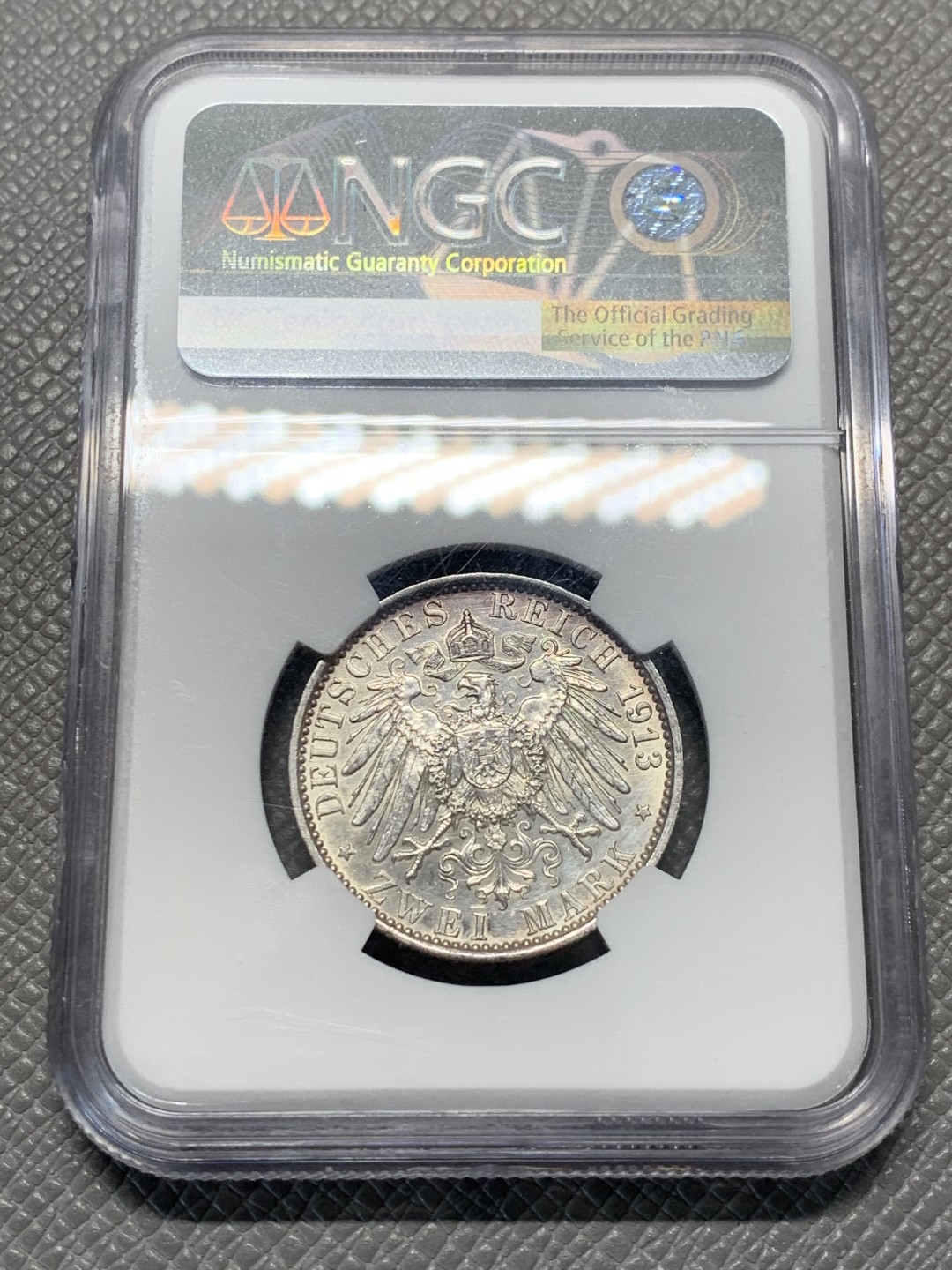 《竞宝斋》第128场-周日，周一 ，2场连拍（全场包邮） NGC-UNCD 德国1913年威廉二世登基纪念 2马克银币 带彩 当个品种不错