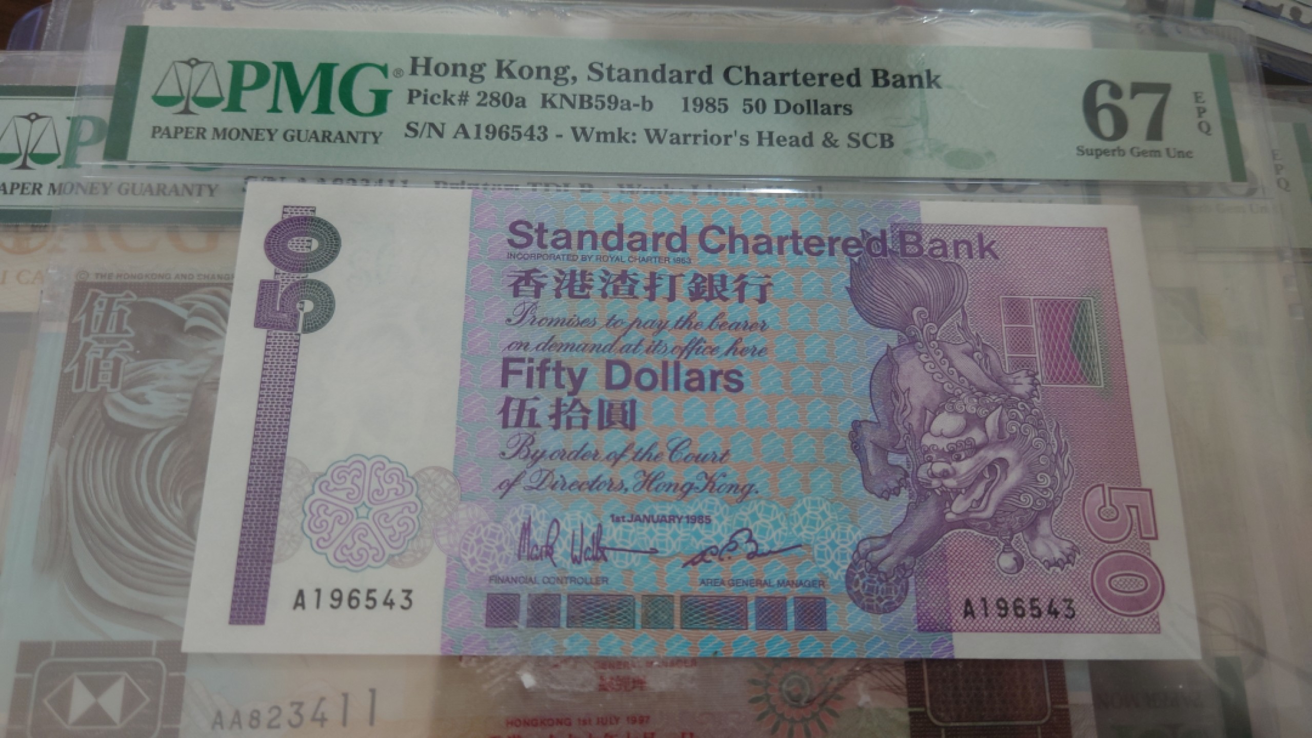 【世界钱币收藏】精品微拍第53期暨2022年第十期 众多裸钞评级币超低价起拍 年末让利 出价极有大可能中标 1985年香港渣打银行50元A冠 长棍 PMG67E高分 