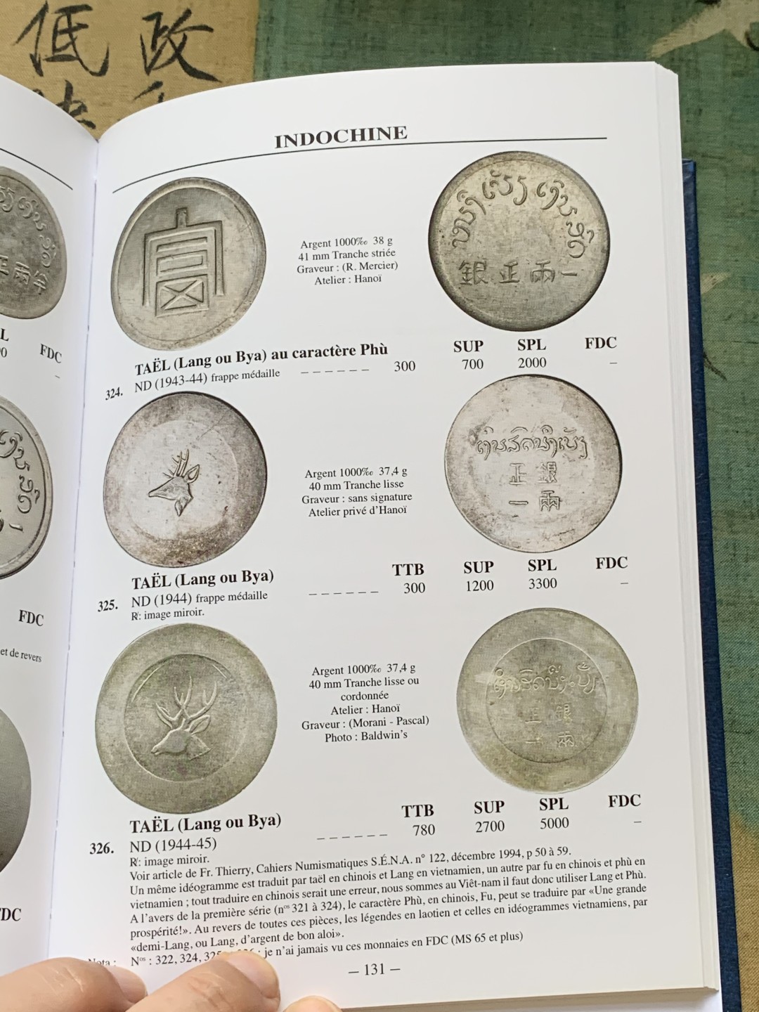 《竞宝斋》第128场-周日，周一 ，2场连拍（全场包邮） 刚拆封未使用《法属印支硬币和代用币》目录 包含东南亚地区 各国法国占领期发行货币，坐洋，大小富，鹿头都在其中，图片清晰详尽，值得收藏