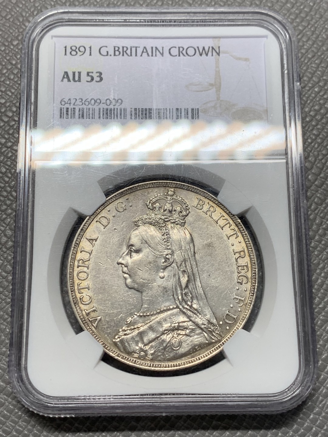 《竞宝斋》第128场-周日，周一 ，2场连拍（全场包邮） NGC AU53 英国 1891年 维多利亚女王 高冠版 马剑克朗大银币 光好 细节不错