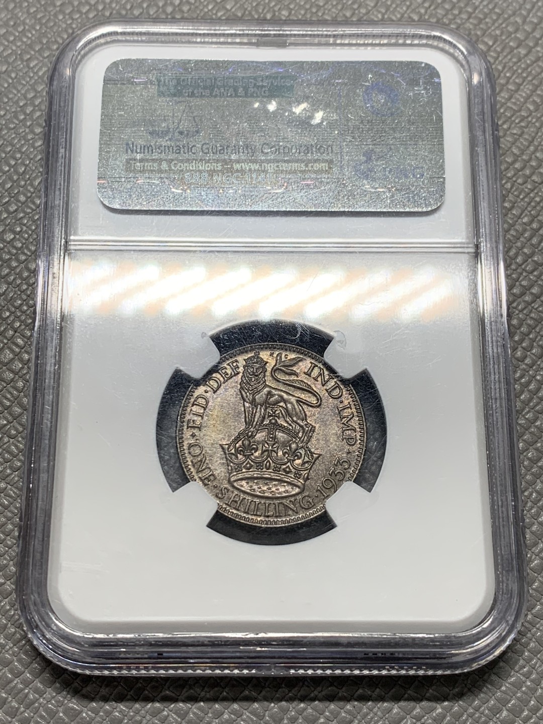 《竞宝斋》第128场-周日，周一 ，2场连拍（全场包邮） PCGS MS64，英国 1933年一先令银币，酱彩包浆，深打细节一流 包浆太好 不好拍照