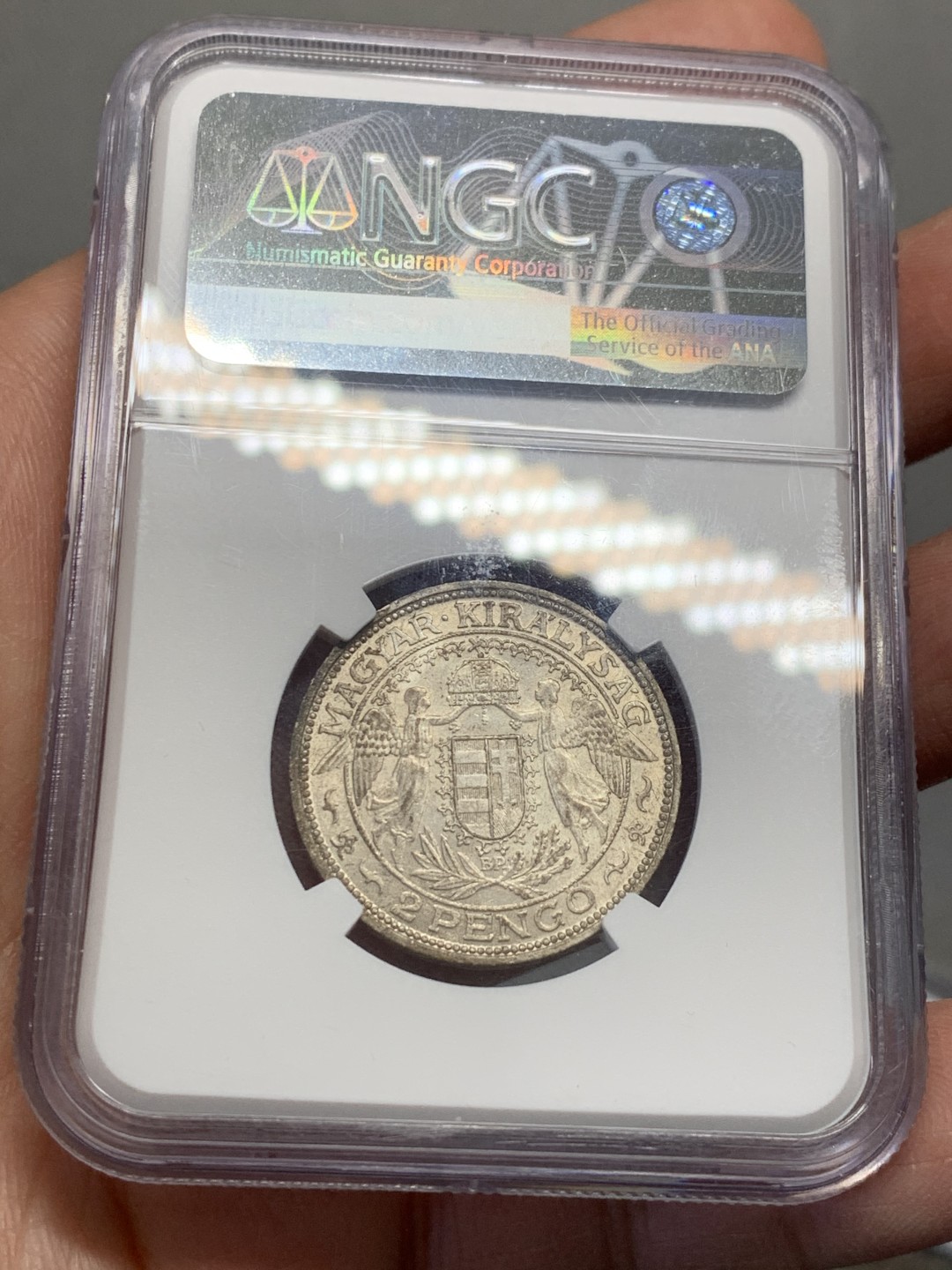 《竞宝斋》第128场-周日，周一 ，2场连拍（全场包邮） NGC-MS63 匈牙利1938年 2潘果银币 圣母抱婴  带转光 底板干净