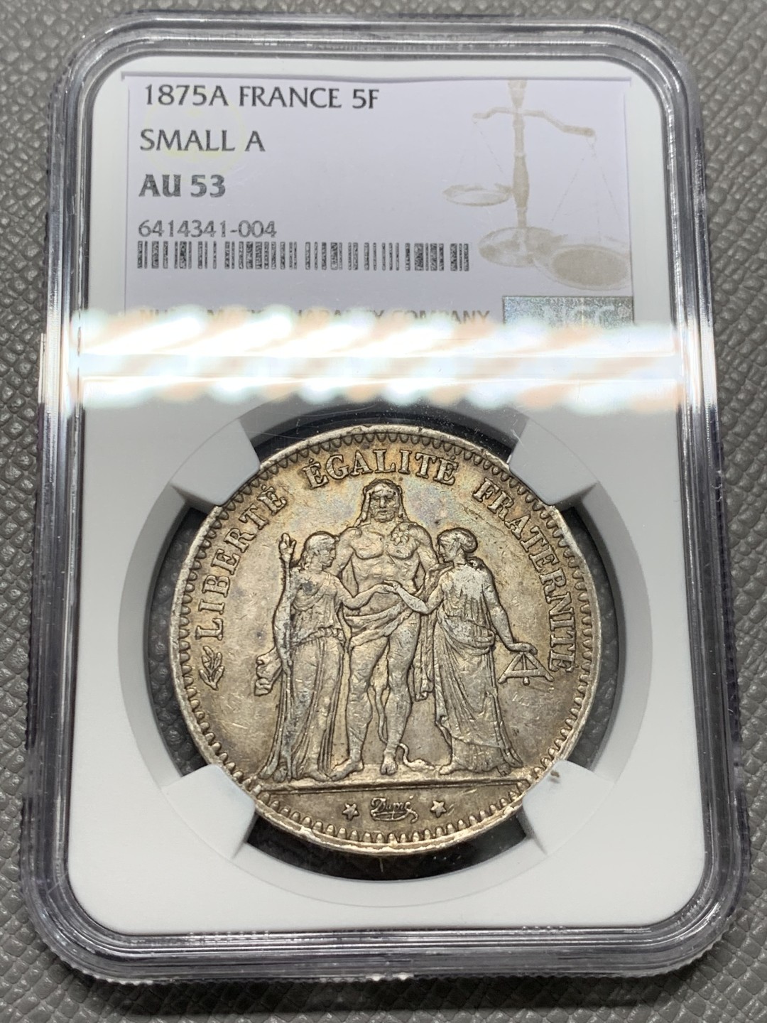 《竞宝斋》第128场-周日，周一 ，2场连拍（全场包邮） NGC AU53 法国 1875年 大力神 5法郎银币 深包浆 小A版 发行量是1873的1/10
