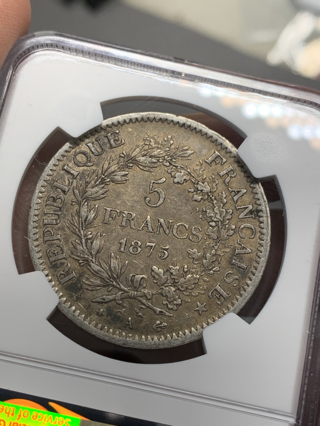 《竞宝斋》第128场-周日，周一 ，2场连拍（全场包邮） NGC AU53 法国 1875年 大力神 5法郎银币 深包浆 小A版 发行量是1873的1/10