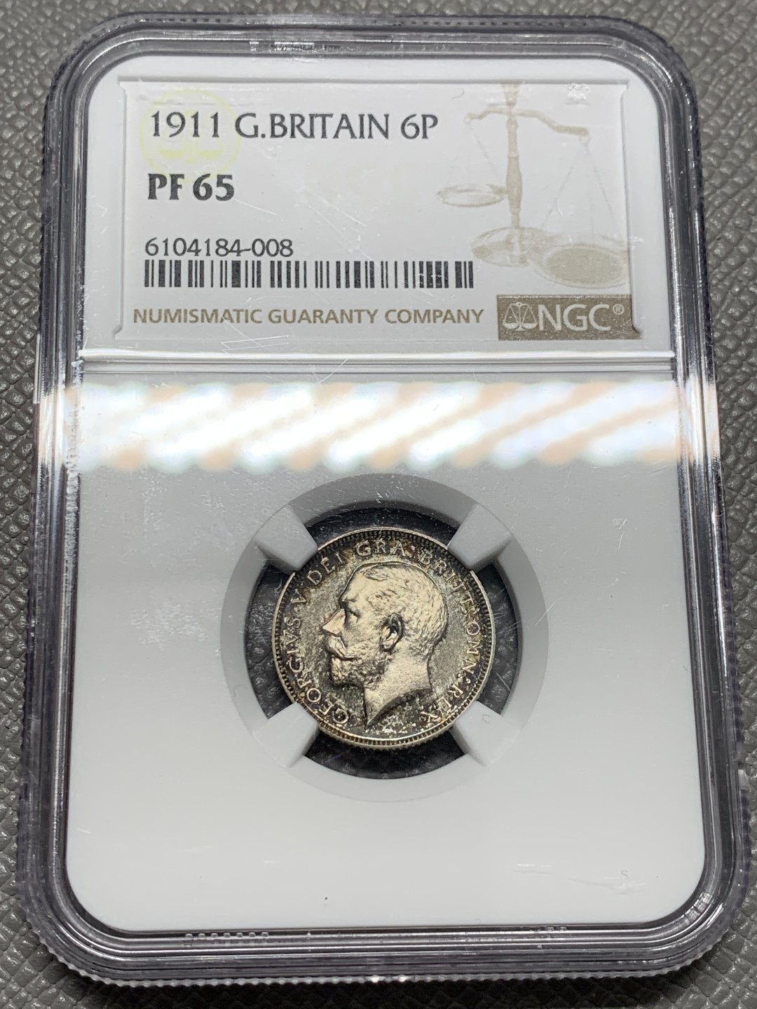 《竞宝斋》第128场-周日，周一 ，2场连拍（全场包邮） NGC PF65 英国1911年乔五精制6便士银币五彩高分