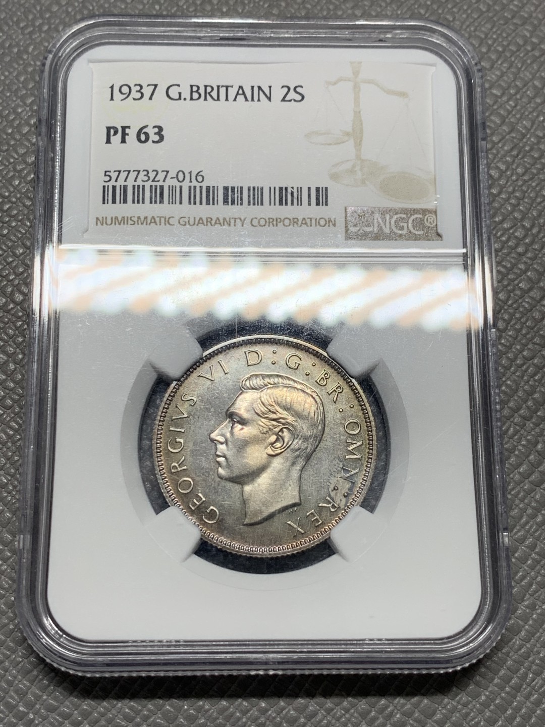 《竞宝斋》第128场-周日，周一 ，2场连拍（全场包邮） NGC-PF63 英国 1937年 乔治六世1福林 精制银币，带彩老包浆，底板镜面感十足