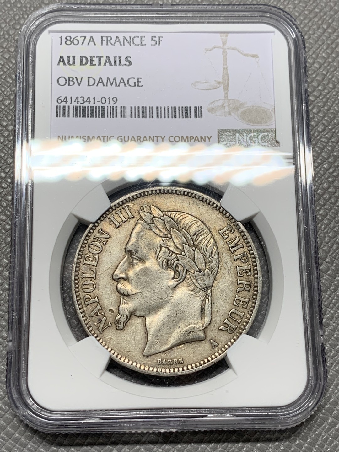 《竞宝斋》第128场-周日，周一 ，2场连拍（全场包邮） NGC AU 法国 1867年 拿三 5法郎银币 原味包浆 细节好 我都没看出 DAMAGE 在哪里