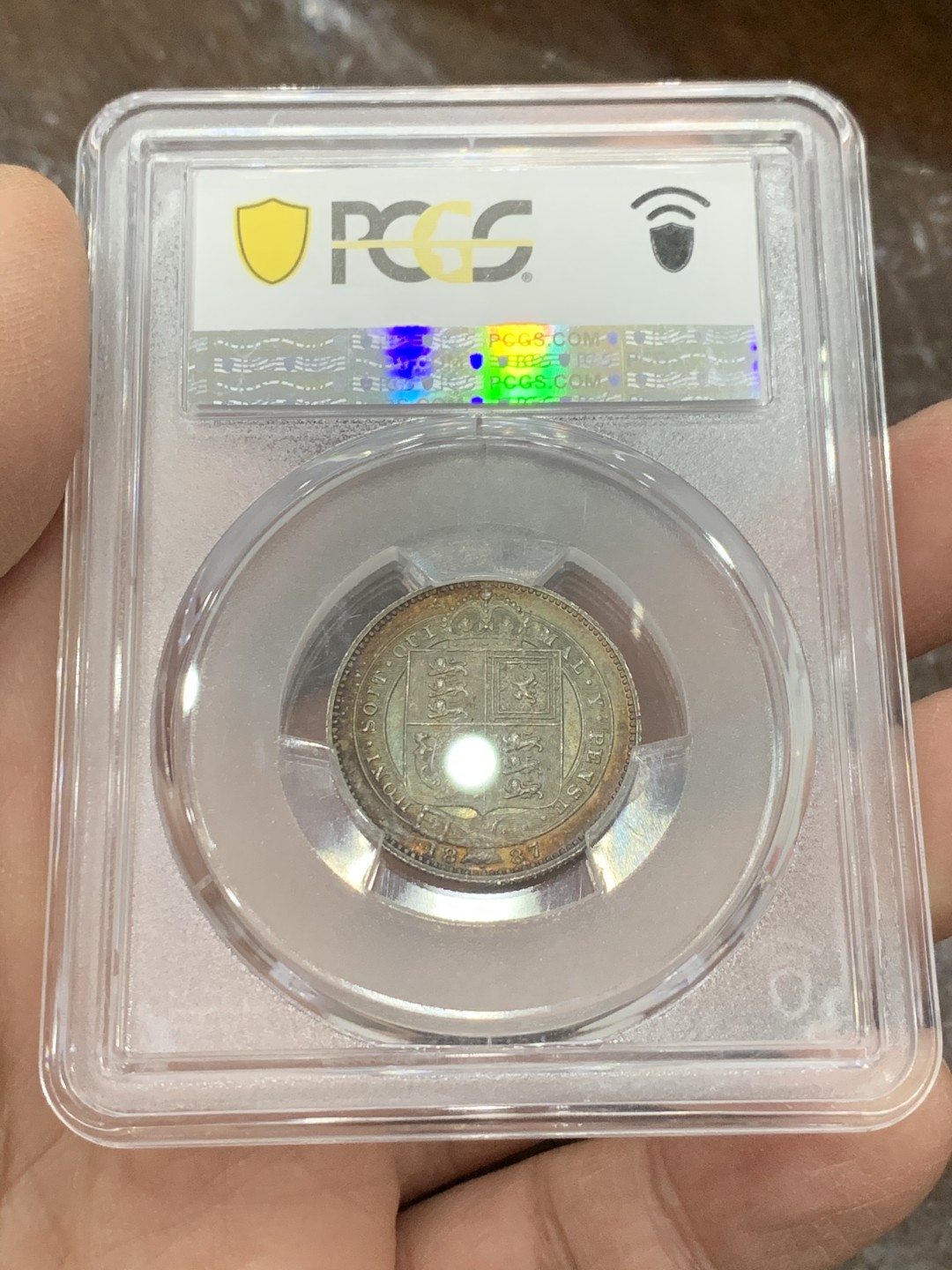 《竞宝斋》第128场-周日，周一 ，2场连拍（全场包邮） PCGS MS64 英国 1887年一先令银币，五彩包浆，收藏级别，非常精致