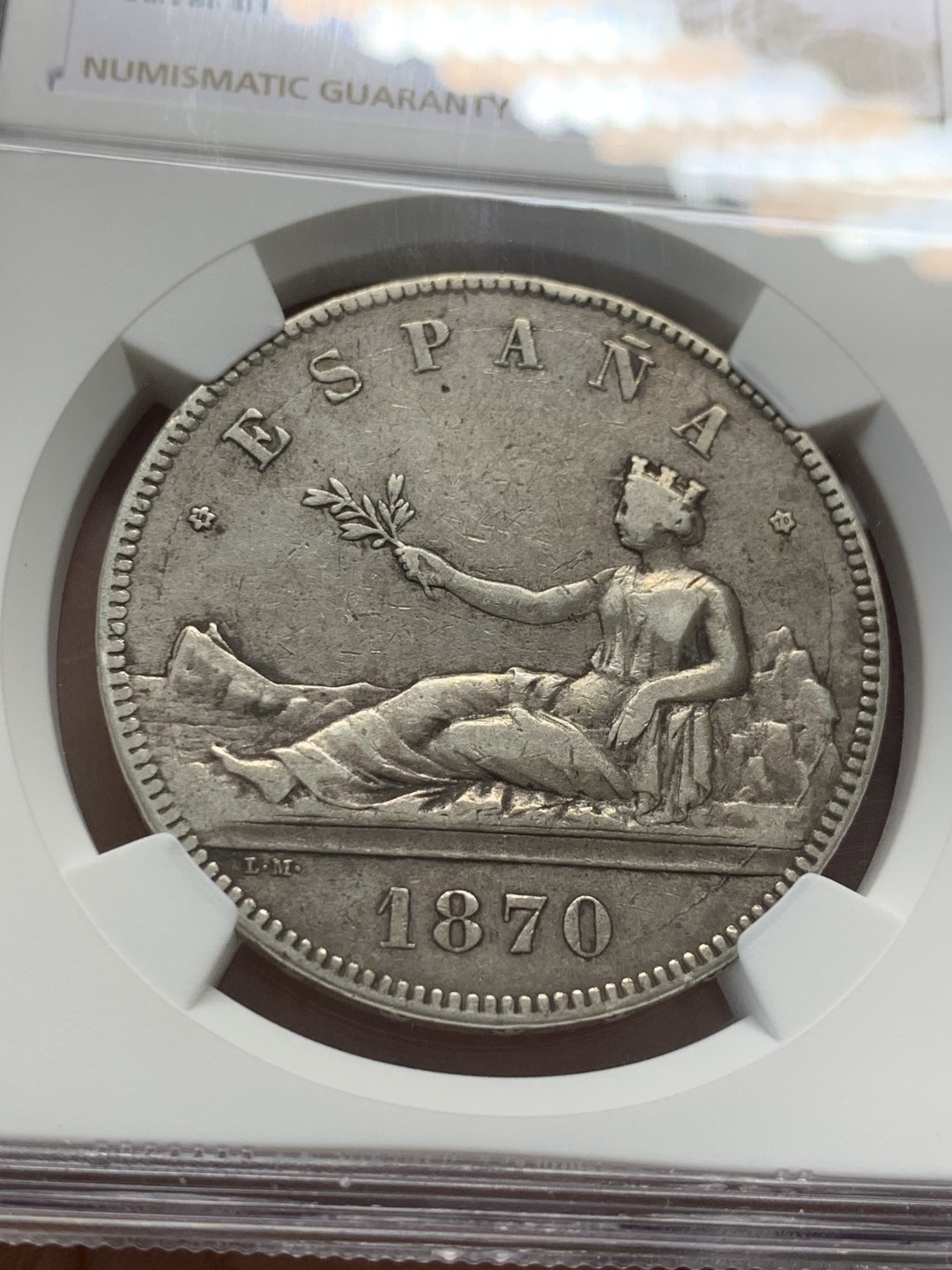 《竞宝斋》第128场-周日，周一 ，2场连拍（全场包邮） NGC-XF40 西班牙1870年 坐人拿花 5比塞塔大银币 原味好品