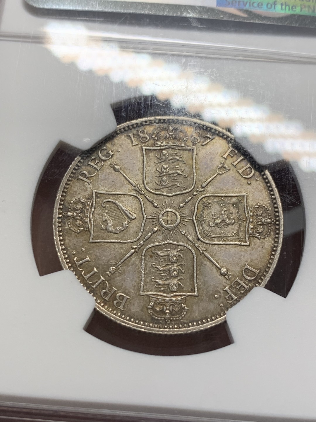 《竞宝斋》第128场-周日，周一 ，2场连拍（全场包邮） NGC AU58 英国 1887年 维多利亚女王 弗洛林/2先令 银币 淡彩包浆耐看 性价比之选