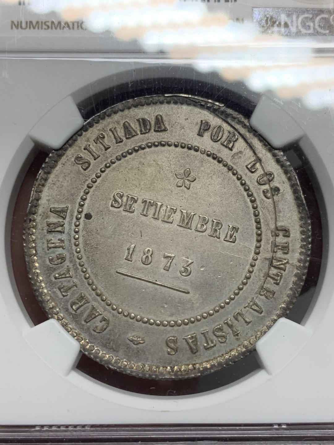 《竞宝斋》第129场-元旦精品特拍 (全场顺丰包邮) NGC MS61 西班牙1873 革命政府5P，卡塔赫纳造币厂，出厂品相，淡钴色包浆，克书unc指导价650刀，少见品种叠加造币厂错误