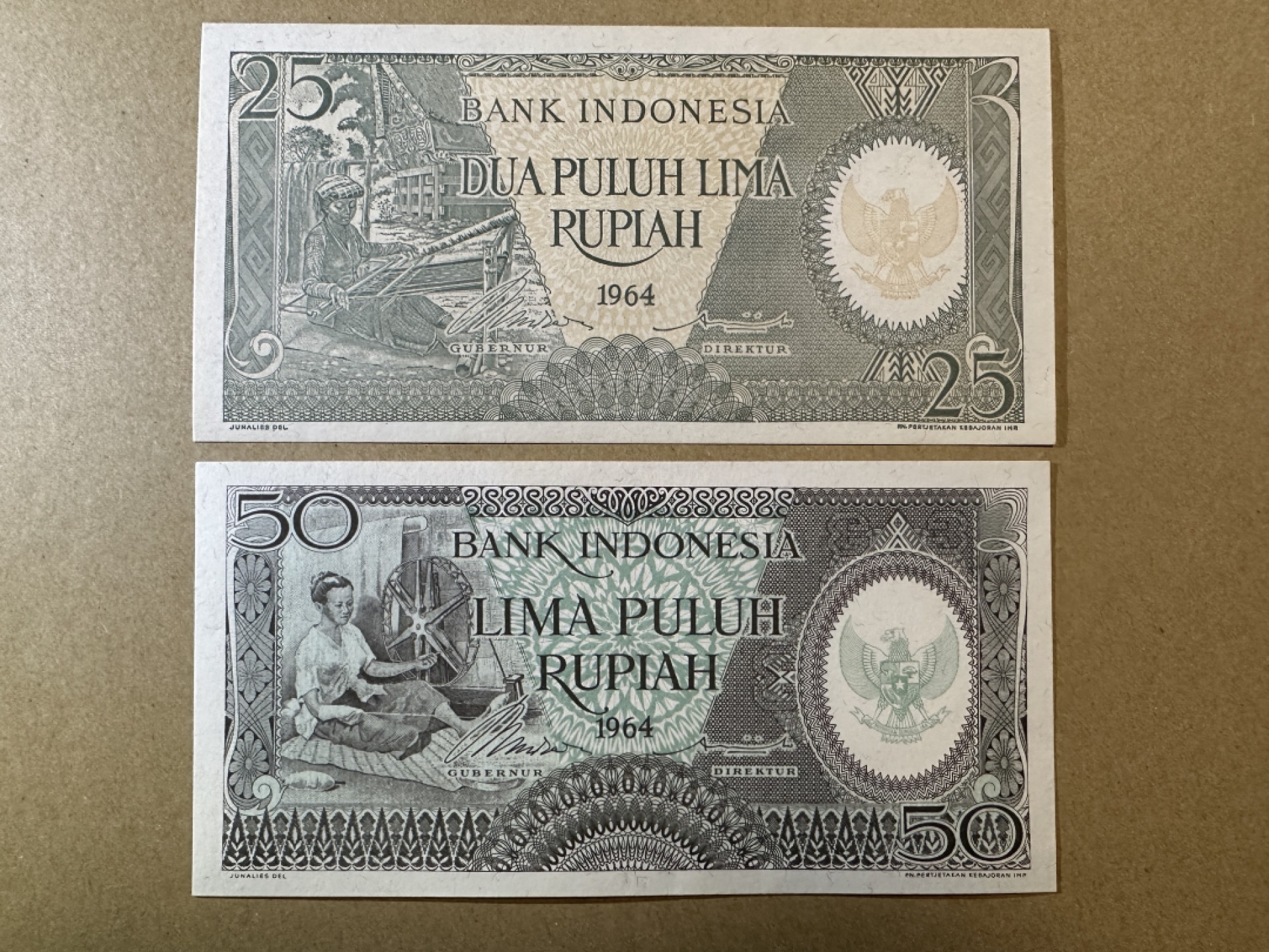 《张总收藏》85期——外币精品 印度尼西亚25、50两张 UNC 1964年