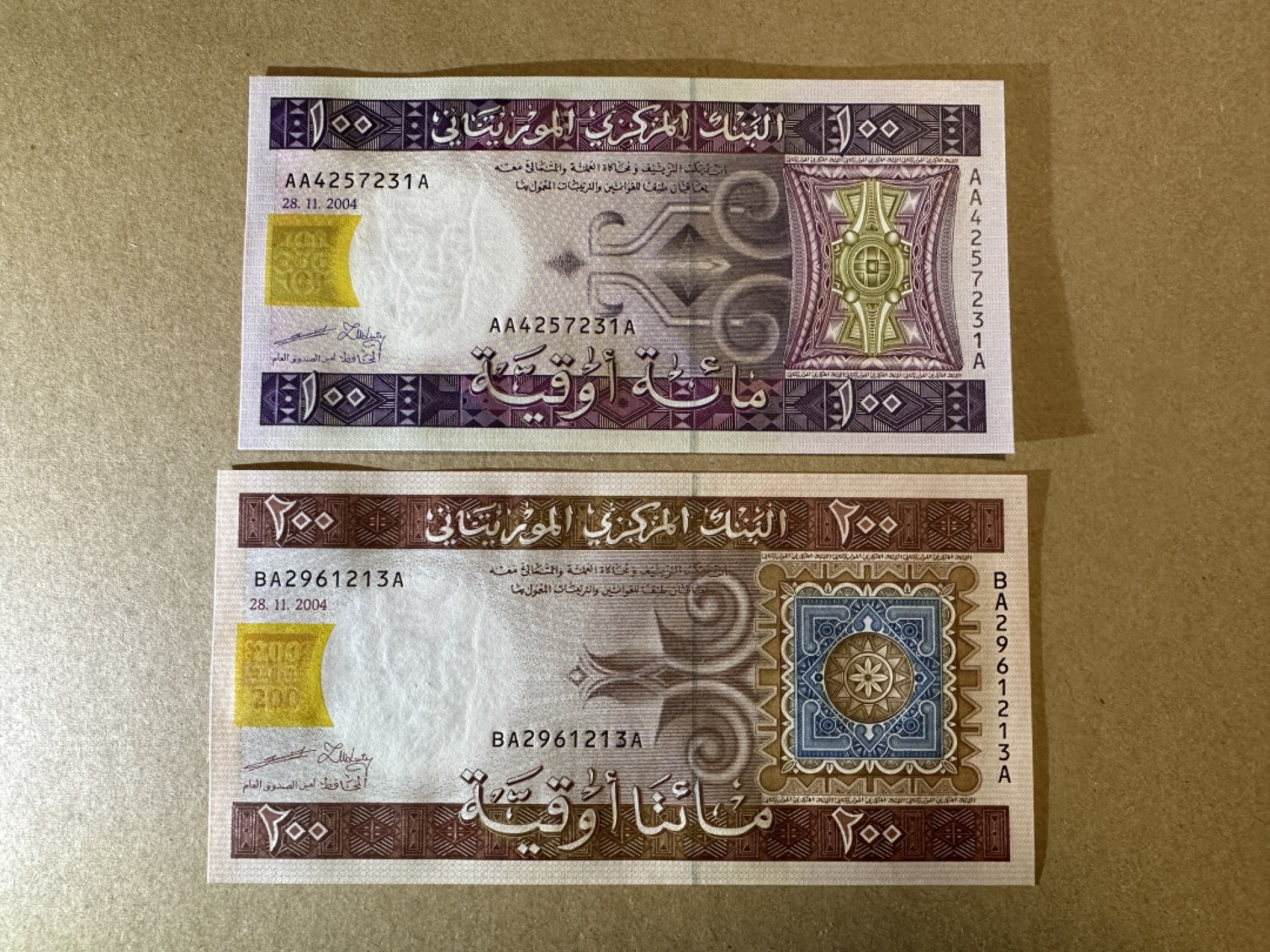 《张总收藏》85期——外币精品 毛里塔尼亚100、200元2张 UNC 2004年