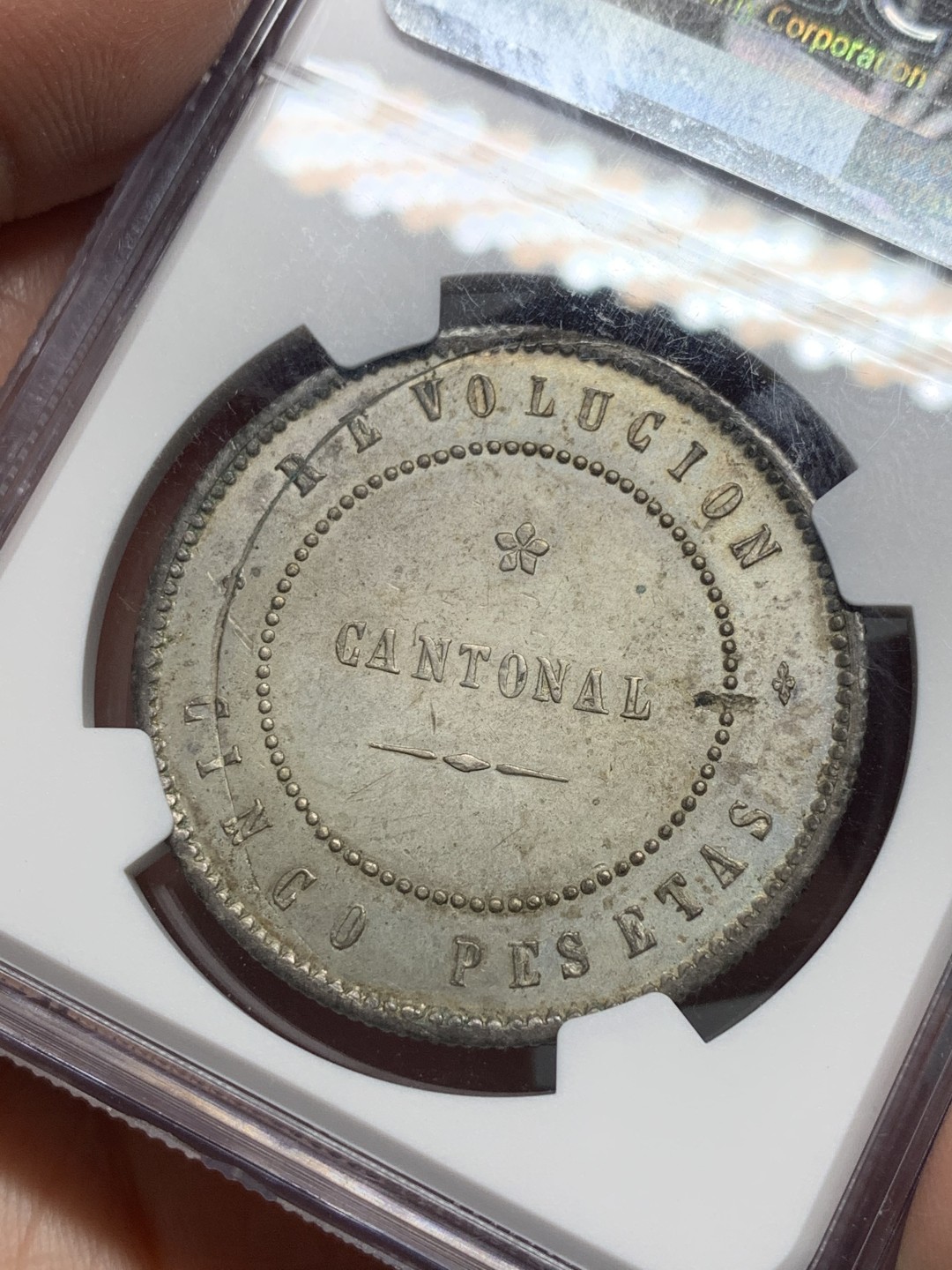 《竞宝斋》第129场-元旦精品特拍 (全场顺丰包邮) NGC MS61 西班牙1873 革命政府5P，卡塔赫纳造币厂，出厂品相，淡钴色包浆，克书unc指导价650刀，少见品种叠加造币厂错误