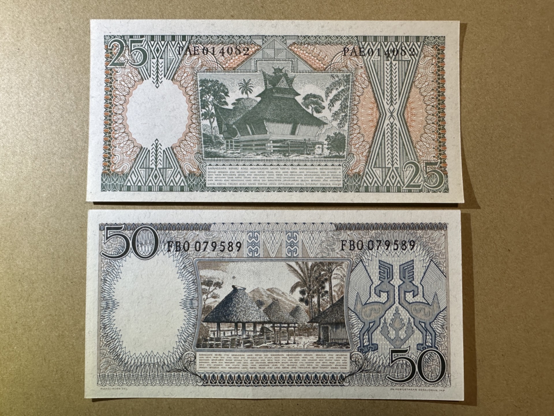 《张总收藏》85期——外币精品 印度尼西亚25、50两张 UNC 1964年