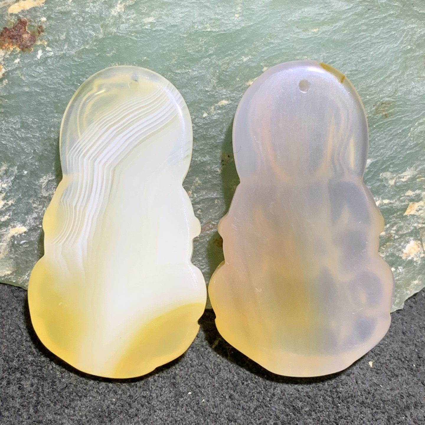 通货高玉化糖料玛瑙雕刻观音一对，