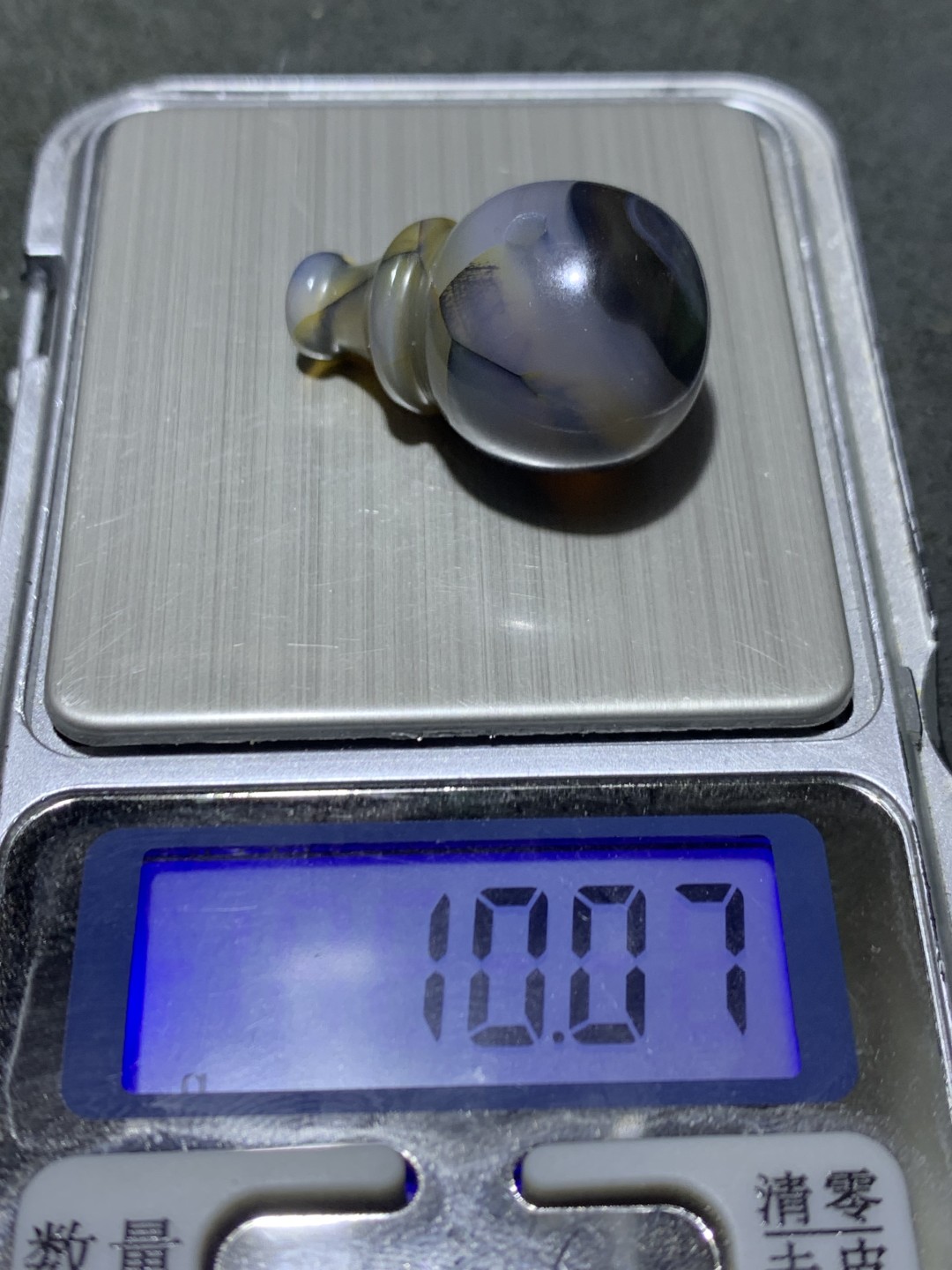 精美龟裂纹九眼页岩一体佛头三通一颗！