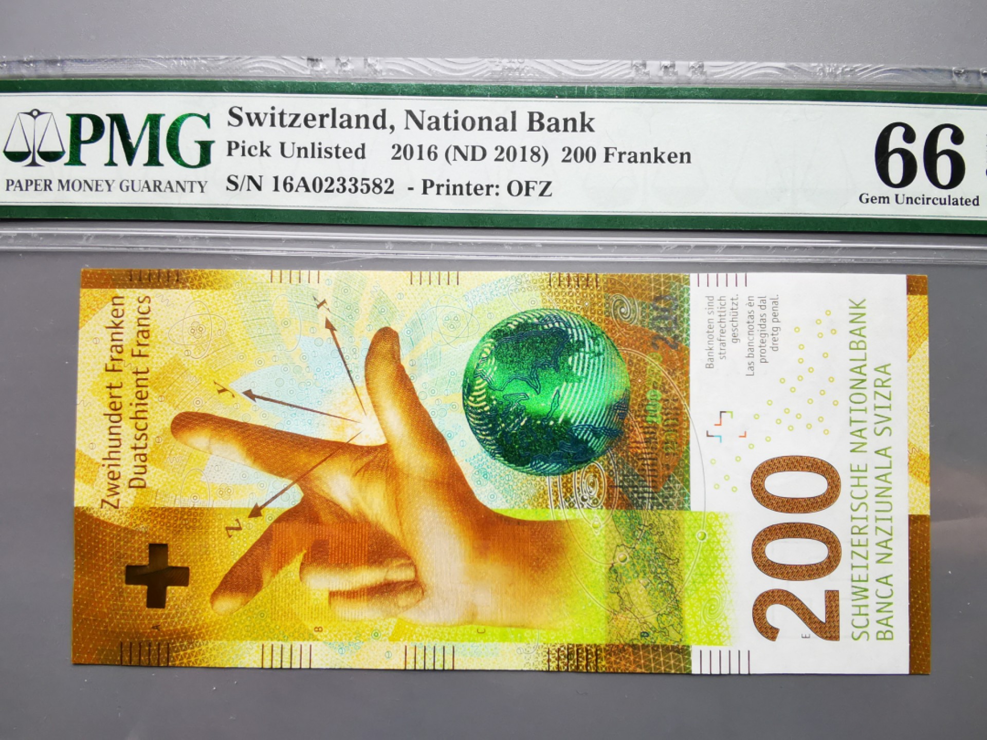 《崇甫堂》-PMG评级世界纸钞专场V 2016年 瑞士新版200瑞士法郎 首发冠16A PMG-66