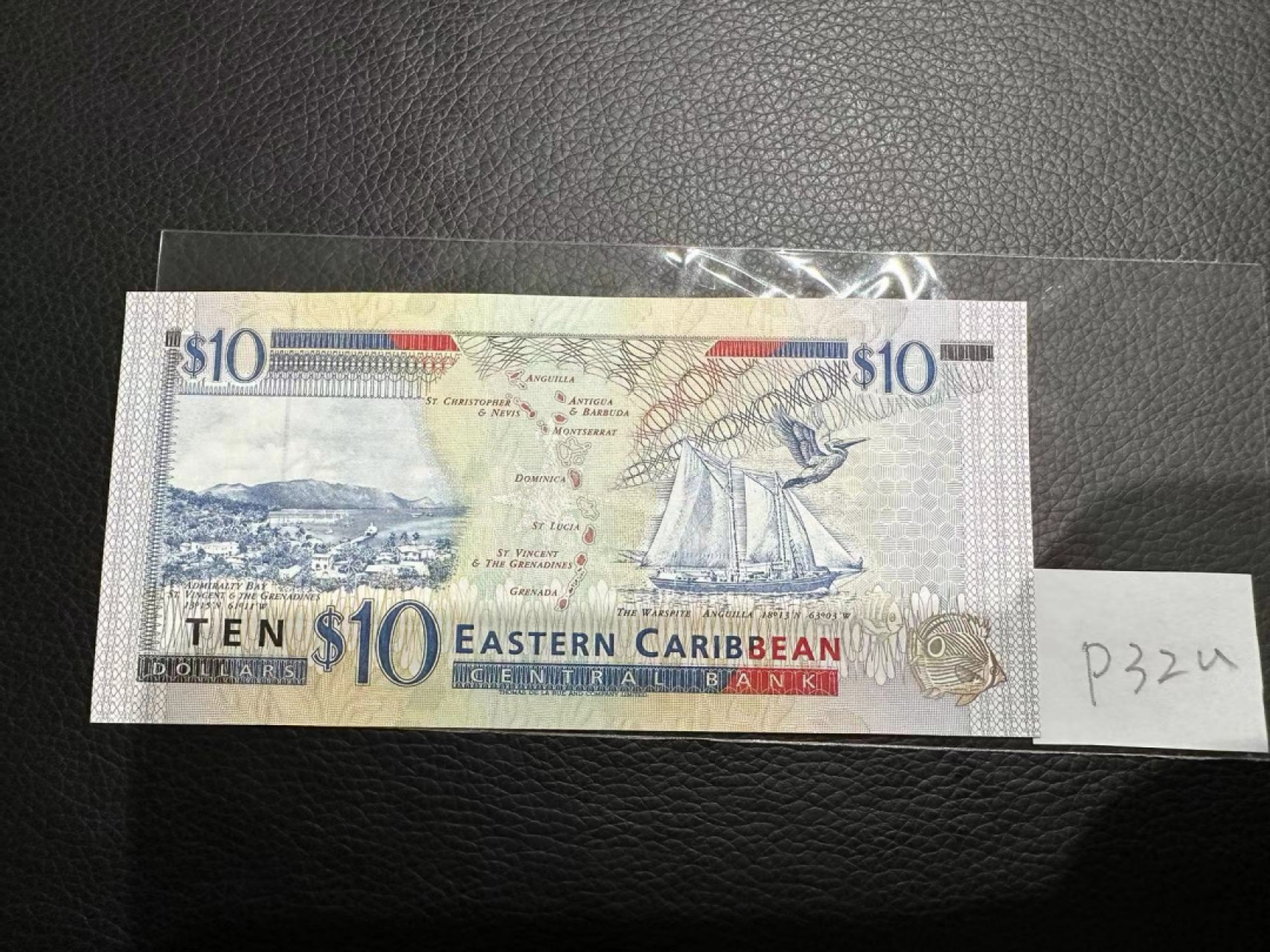 《外钞收藏家》第二百三十期英国女王专场（百慕大与东加勒比） 东加勒比1994年版10元，后缀U（安圭拉）	P32u 全新UNC