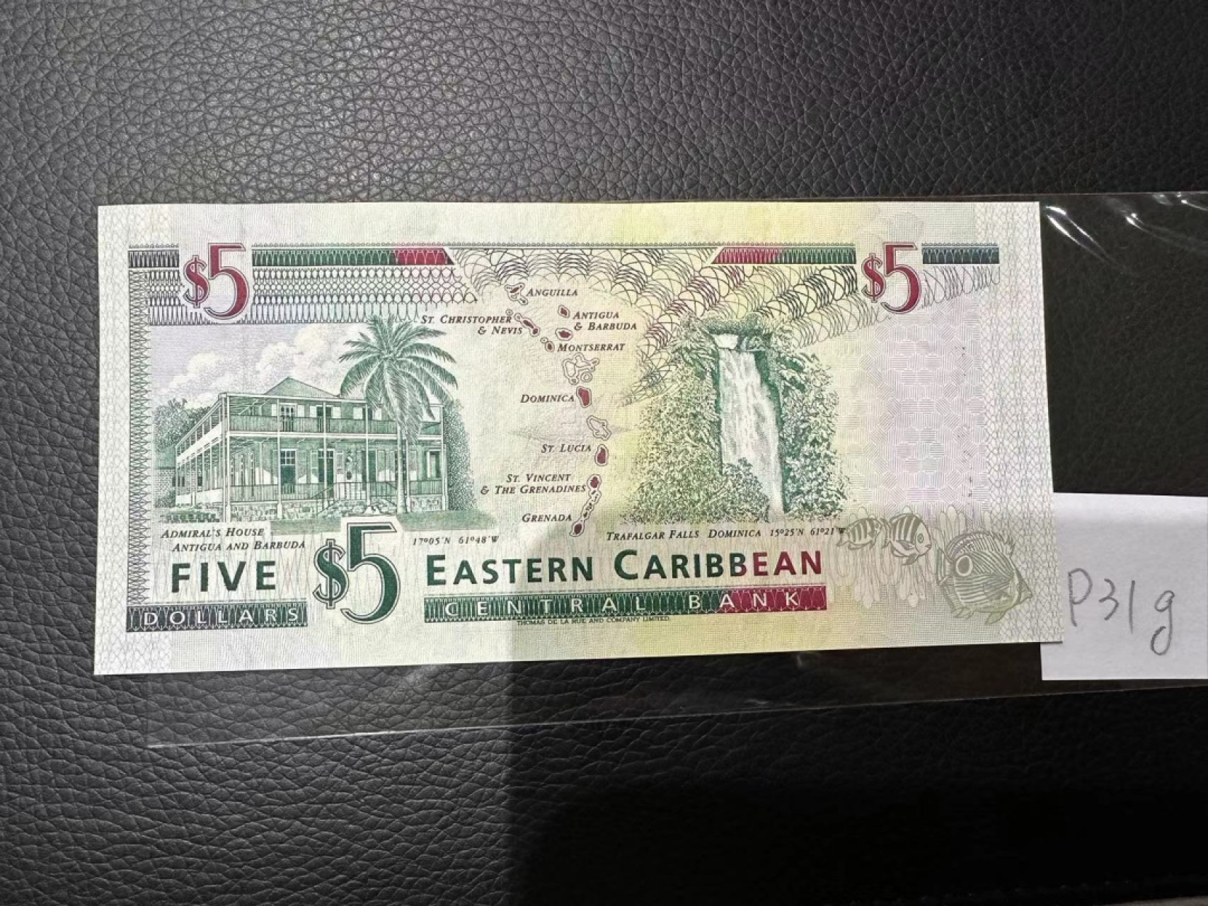 《外钞收藏家》第二百三十期英国女王专场（百慕大与东加勒比） 东加勒比1994年版5元，后缀G（格林纳达）	P31g 全新UNC