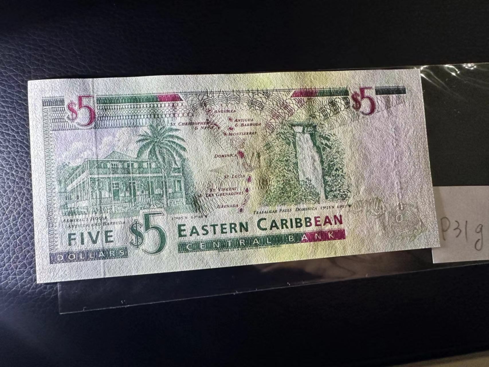 《外钞收藏家》第二百三十期英国女王专场（百慕大与东加勒比） 东加勒比1994年版5元，后缀G（格林纳达）	P31g 全新UNC