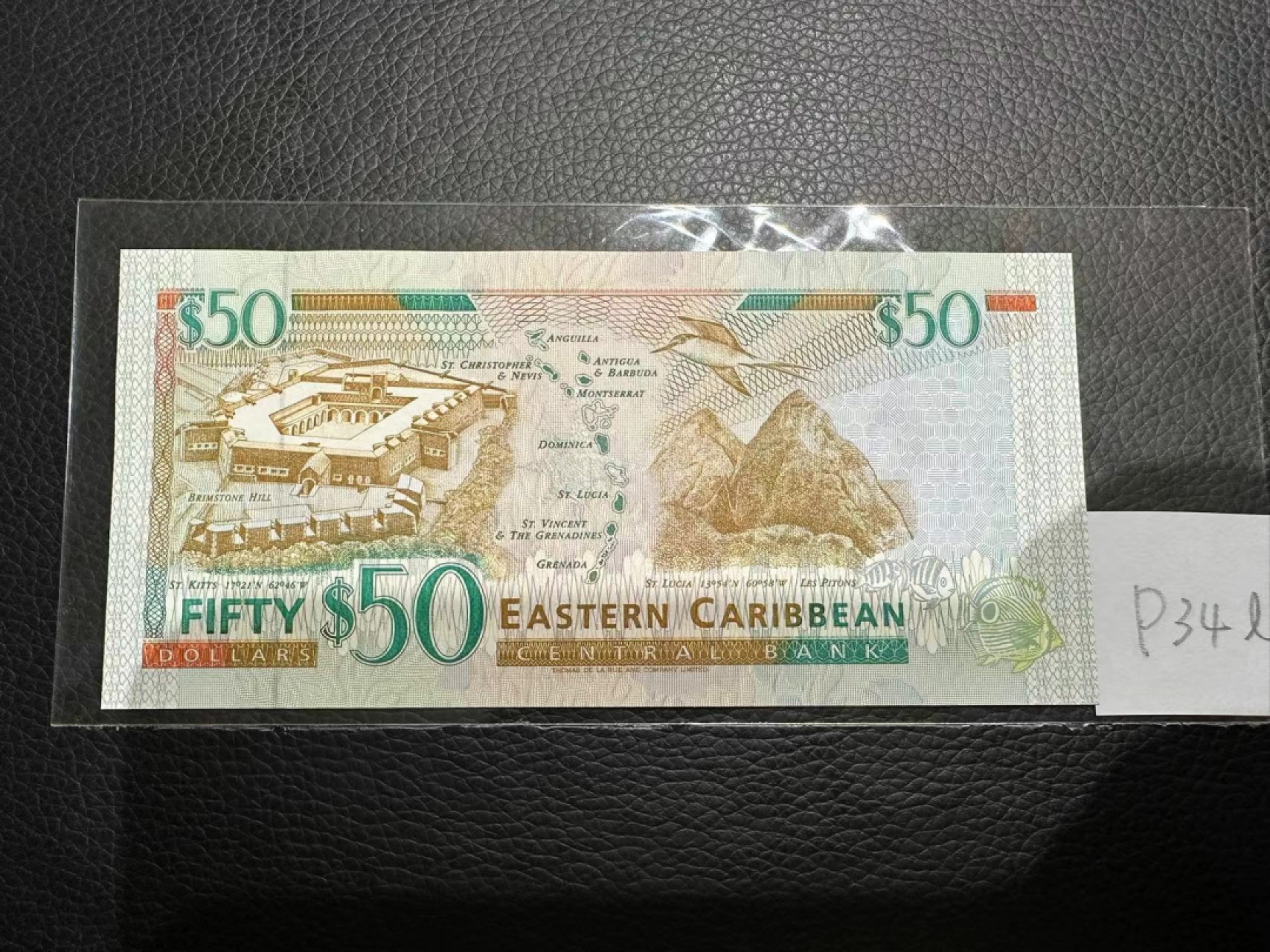 《外钞收藏家》第二百三十期英国女王专场（百慕大与东加勒比） 东加勒比1994年版50元，后缀L（圣卢西亚）	P34l 全新UNC