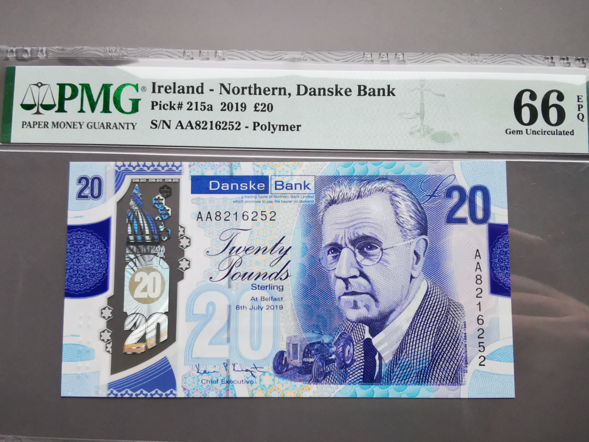 《崇甫堂》-PMG评级世界纸钞专场V 英国 2019年 AA字冠首发 丹斯克银行20镑 PMG-66 Pick:215a