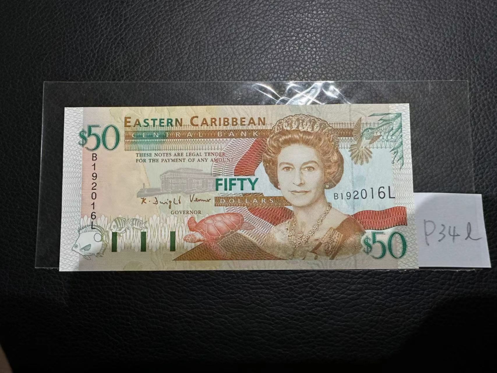 《外钞收藏家》第二百三十期英国女王专场（百慕大与东加勒比） 东加勒比1994年版50元，后缀L（圣卢西亚）	P34l 全新UNC