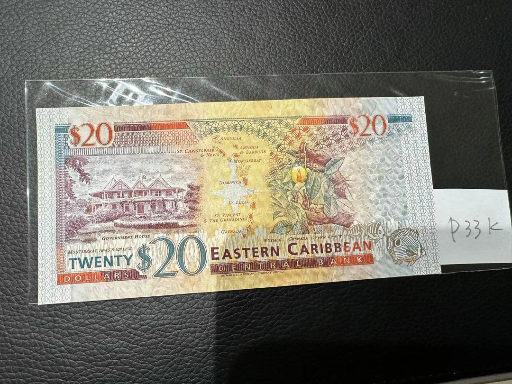 《外钞收藏家》第二百三十期英国女王专场（百慕大与东加勒比） 东加勒比1994年版20元，后缀K（圣基茨）	P33k 全新UNC