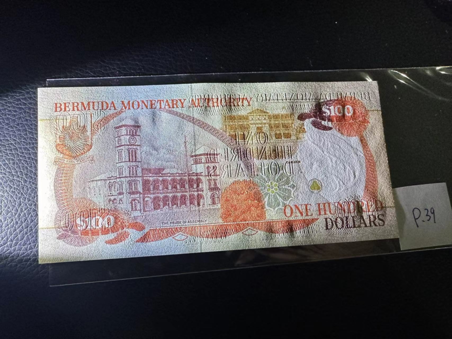 《外钞收藏家》第二百三十期英国女王专场（百慕大与东加勒比） 百慕大1989年100元，522号券	P39 全新UNC