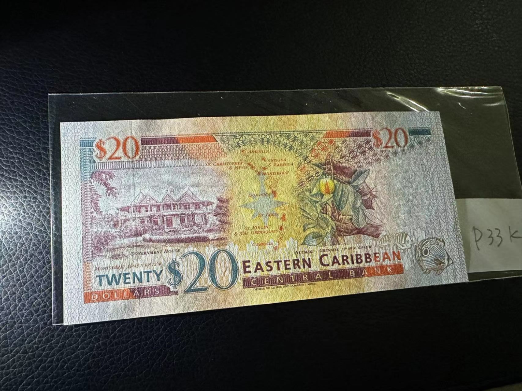 《外钞收藏家》第二百三十期英国女王专场（百慕大与东加勒比） 东加勒比1994年版20元，后缀K（圣基茨）	P33k 全新UNC