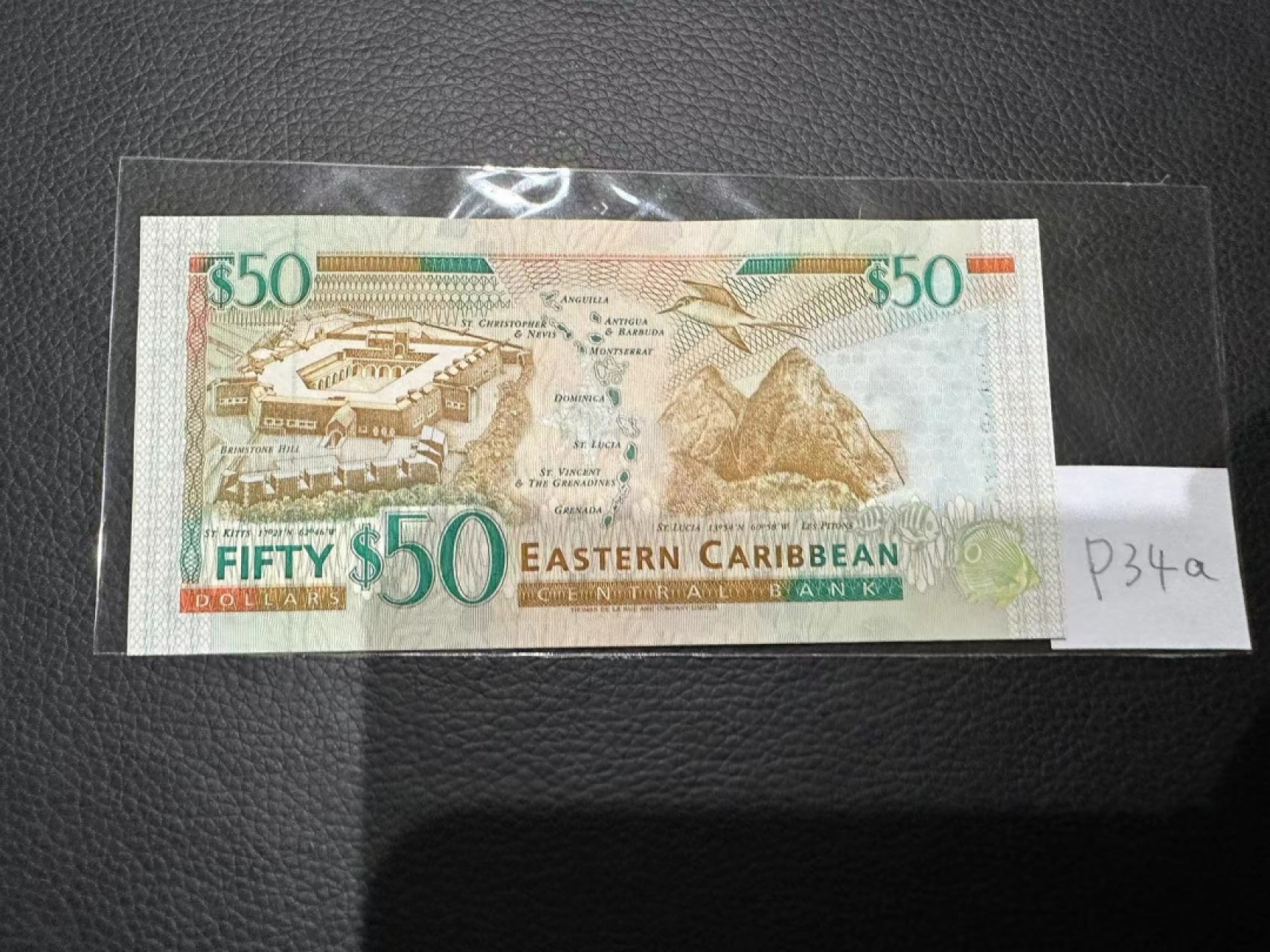 《外钞收藏家》第二百三十期英国女王专场（百慕大与东加勒比） 东加勒比1994年版50元，后缀A（安提瓜）	P34a 全新UNC