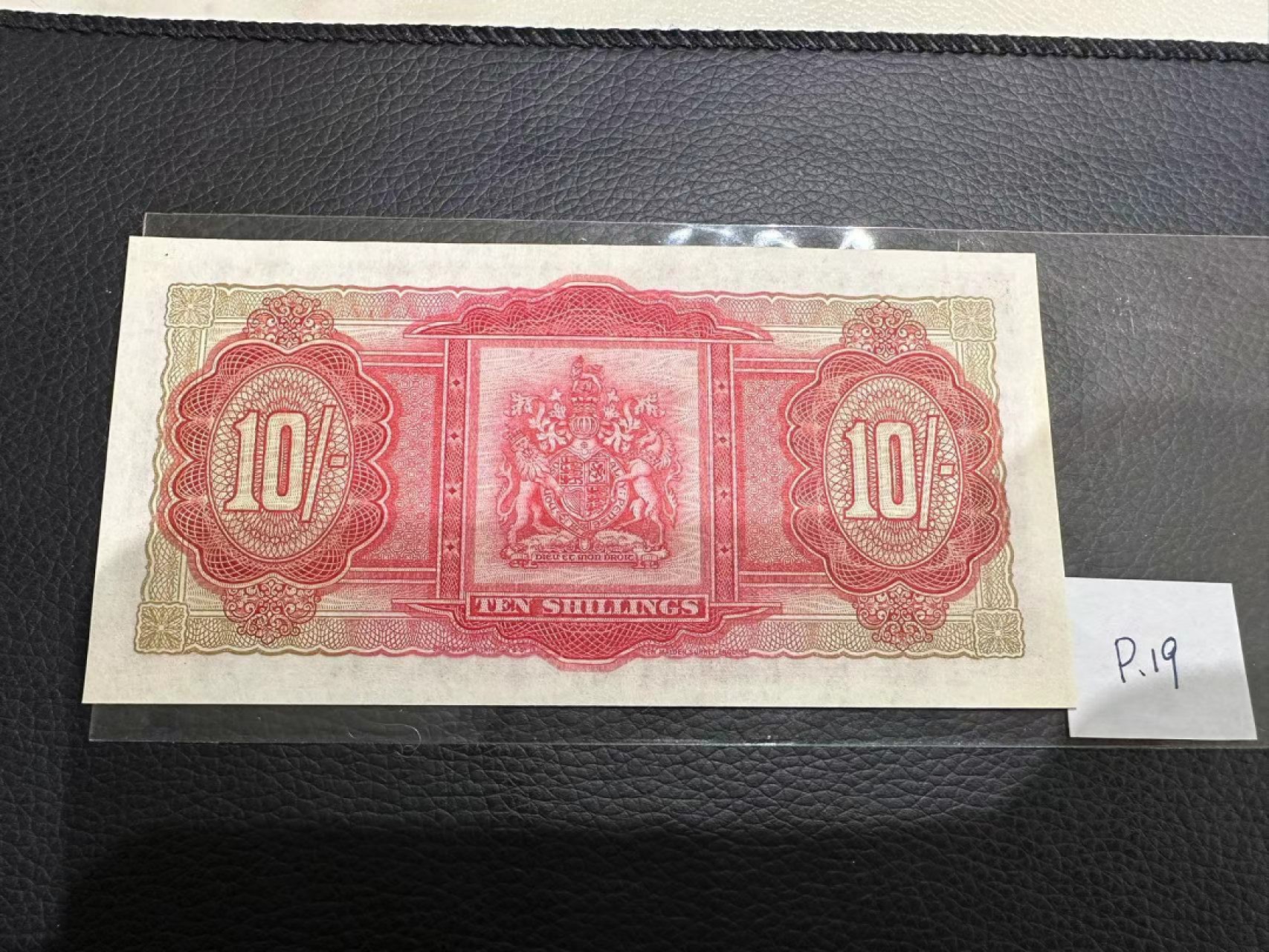 《外钞收藏家》第二百三十期英国女王专场（百慕大与东加勒比） 百慕大1957年10先令	P19 AU品相 有暗折