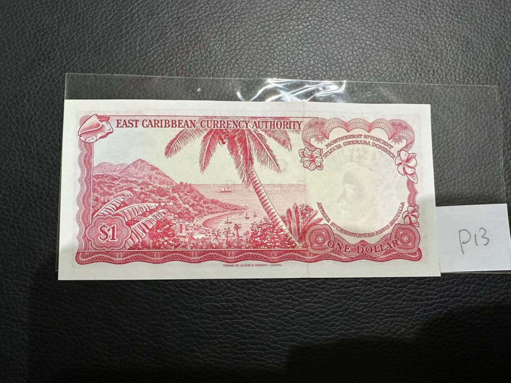 《外钞收藏家》第二百三十期英国女王专场（百慕大与东加勒比） 东加勒比1965年发行1元	P13 全新UNC