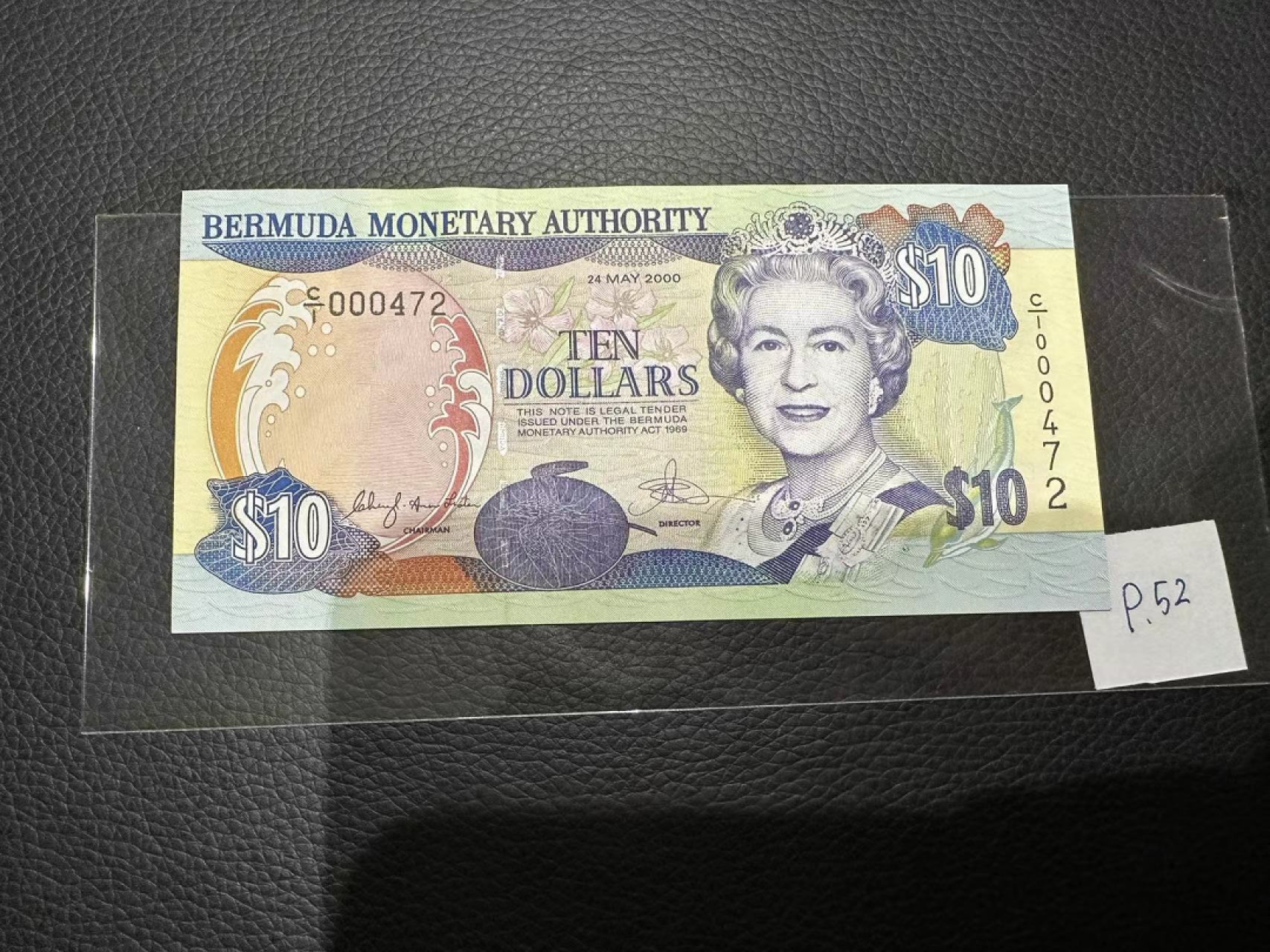 《外钞收藏家》第二百三十期英国女王专场（百慕大与东加勒比） 百慕大2000年10元，472号券	P52 全新UNC