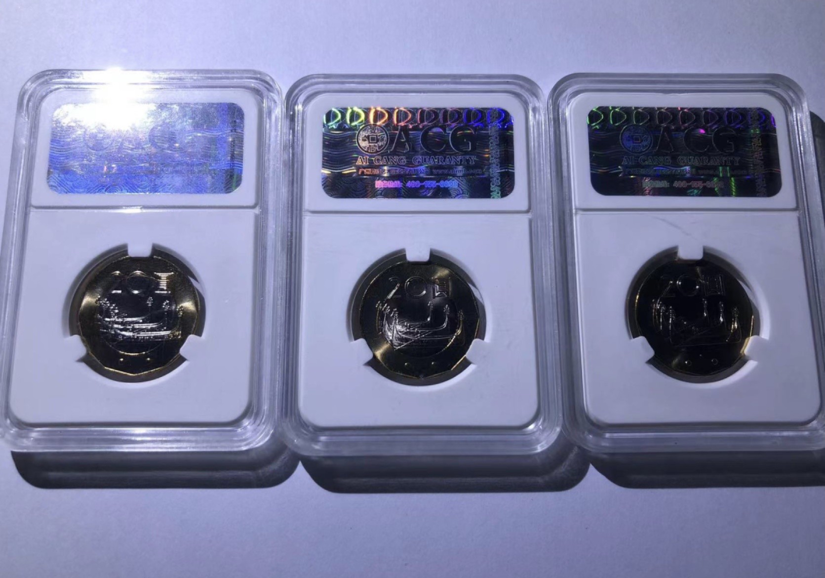 收藏联盟Quantum Auction 第224期拍卖 中国台湾2001年20元抗日英雄莫那鲁道纪念币3枚 ACG68