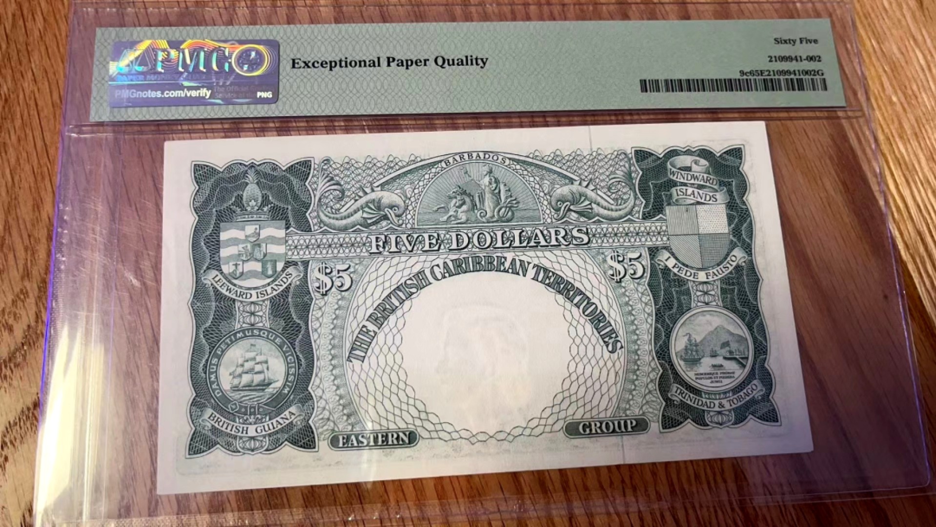 【Blue Auction】✨世界纸币精拍第280期——喜迎新春特别场【精】 【亚军分】英属东加勒比 1961-62年5元 PMG65EPQ 该面值高分非常少见 大冠女王 