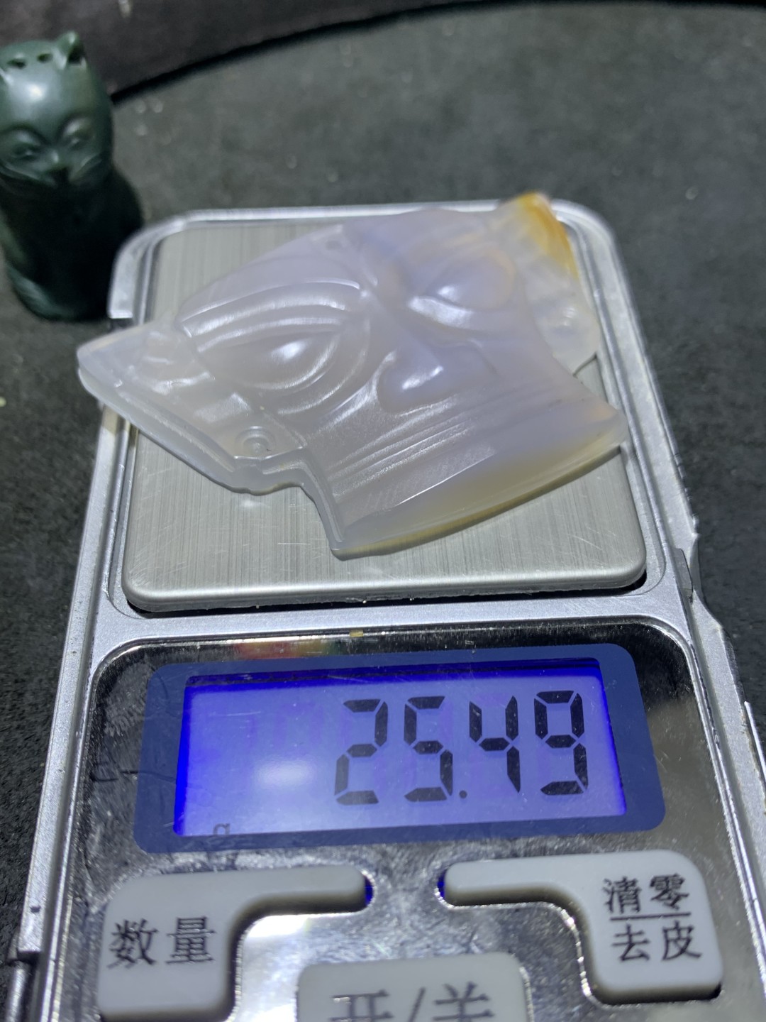 高玉化巴西玛瑙雕刻三星堆面具吊坠一个，