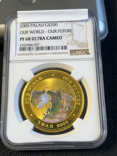 【海寧潮】帕劳1999年千禧年我们的世界1盎司纯金彩金币NGC-PF68，999金，1盎司