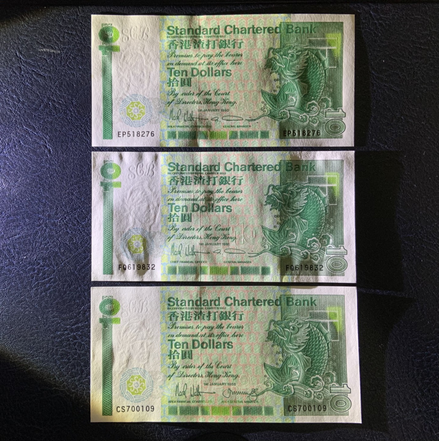 收藏联盟Quantum Auction 第226期拍卖 中国香港渣打银行1988-90年10元三张  品相UNC 紫光灯下边缘有轻微的黄点