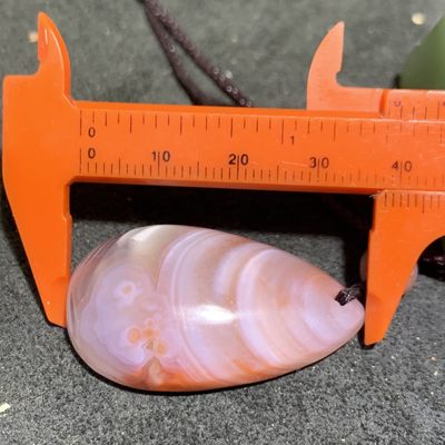 精美川料南红玛瑙天眼缠丝纹吊坠一个 精美川料南红玛瑙天眼缠丝纹吊坠一个