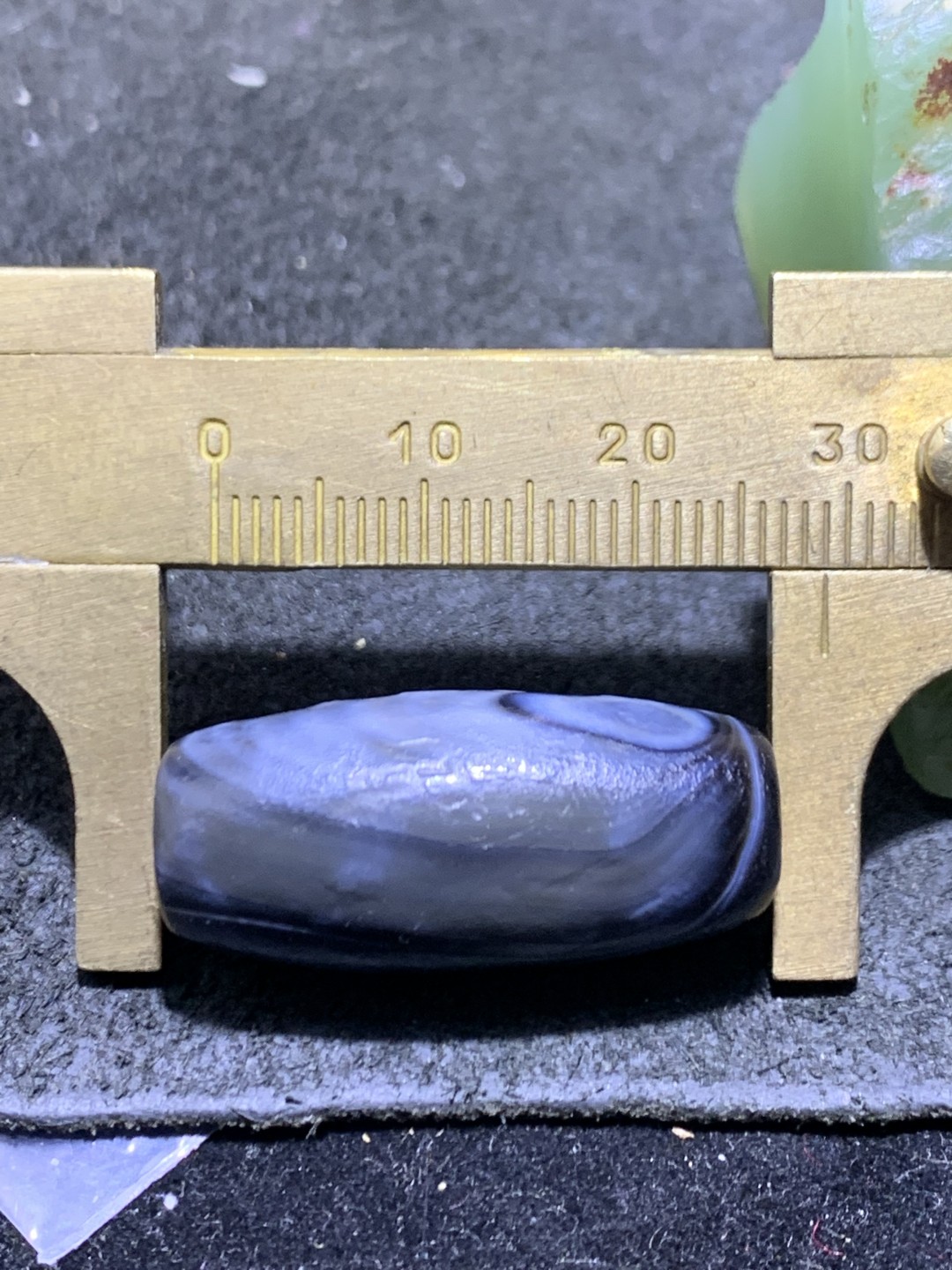 精美风化纹天眼药师玛瑙桶珠一个，