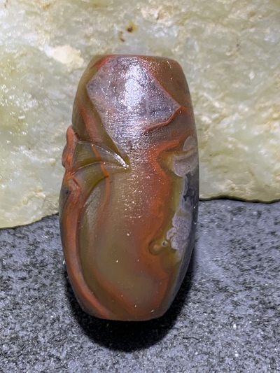 精美亚光冰飘战国红玛瑙手工俏色巧雕寿带鸟桶珠一颗 精美亚光冰飘战国红玛瑙手工俏色巧雕寿带鸟桶珠一颗