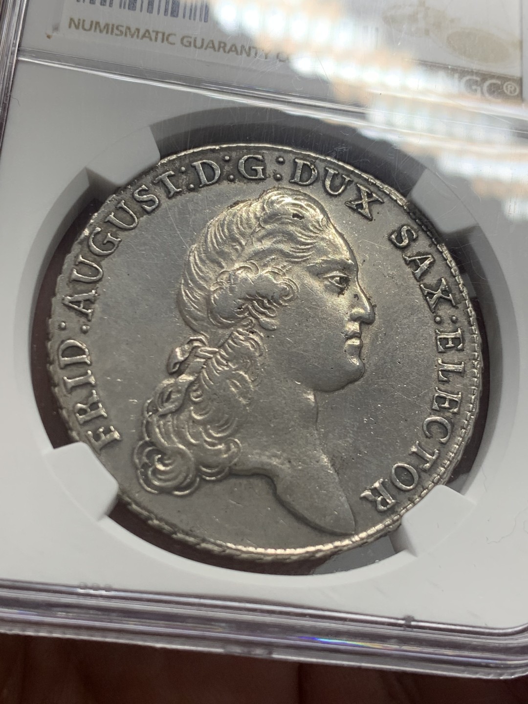 《竞宝斋》第130场-周日，周一连拍 (全场包邮) NGC AU 1789年德国萨克森泰勒大银币 压印人物清晰 底板干净 难的佳品