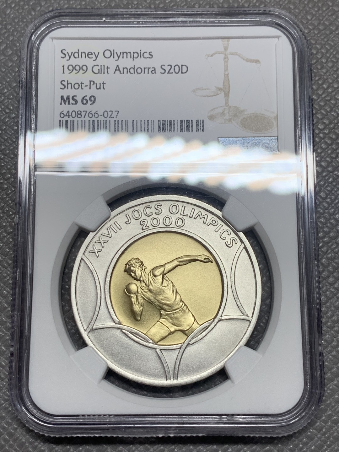 《竞宝斋》第130场-周日，周一连拍 (全场包邮) 唯一冠军分 NGC-MS69 安道尔1999年 悉尼奥运铅球 20第纳尔大银币 含1.5克金 发行量5000枚